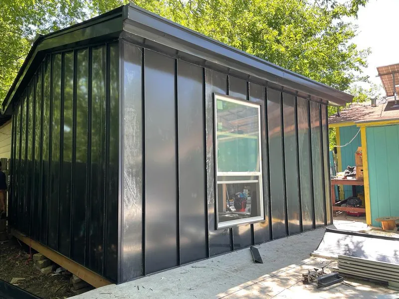 Black standing seam metal wall panels for Roof Inspection in Westbrook